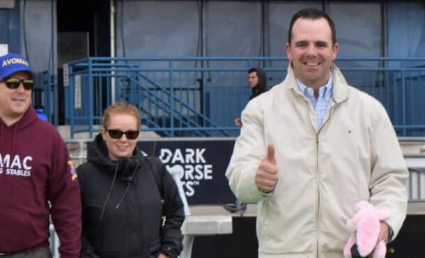 Don MacRae walks out to the winner's circle at Woodbine Racetrack.