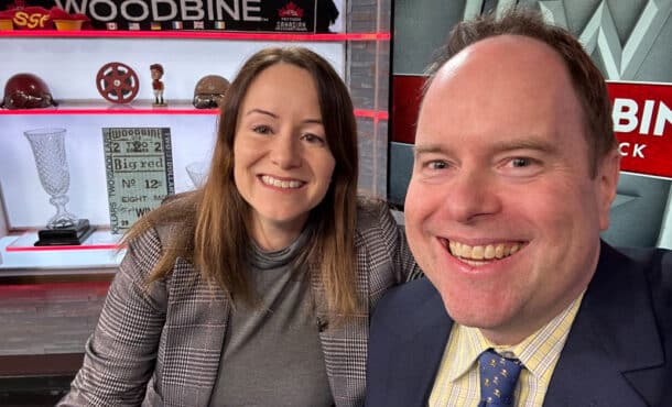 A woman and a man in a broadcast studio.