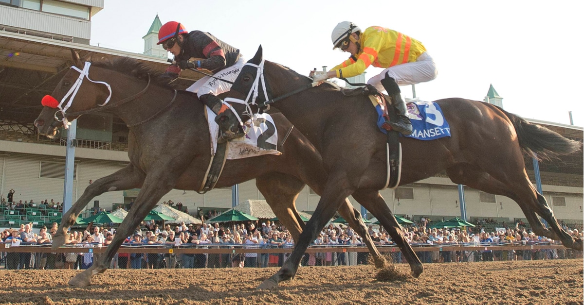 Horses at the wire of the Prince of Wales Stakes.