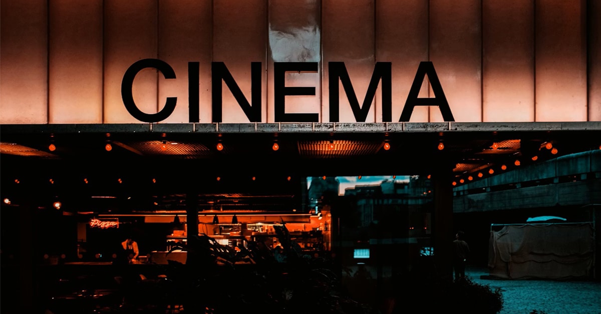 The word cinema on the side of a building.