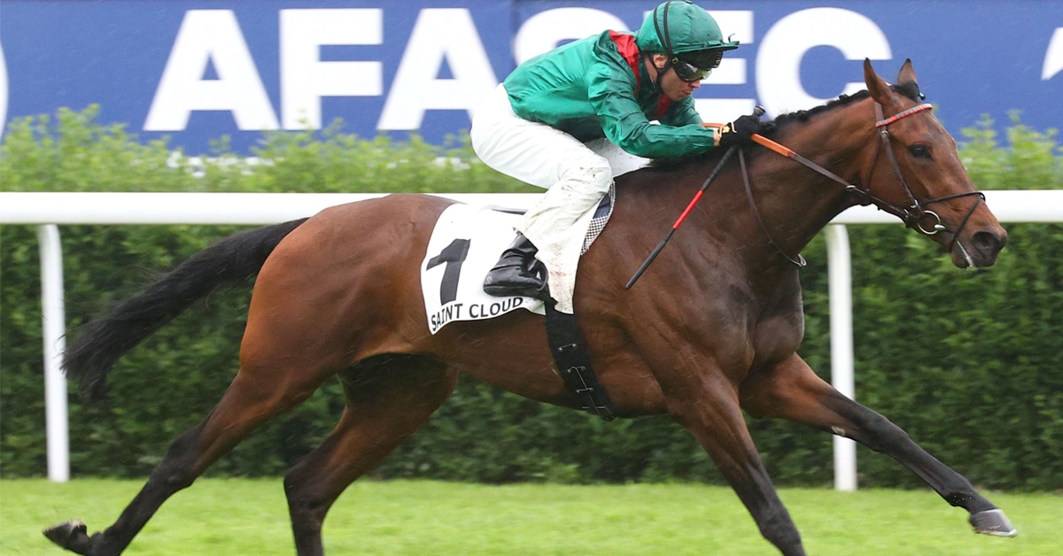 A bay horse winning a race in Europe.